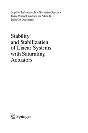 Stability and stabilization of linear systems with saturating actuators